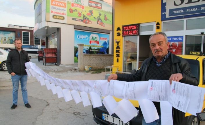 Yediği trafik cezaları 6 metreyi buldu