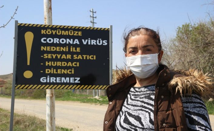 Korona virüs uyarı tabelası dikkate alınmayınca köyü römorkla kapadı