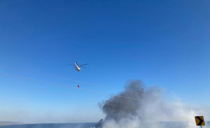 Ünlü tatil merkezi Alaçatı’daki yangın tatilcilere korku dolu anlar yaşattı