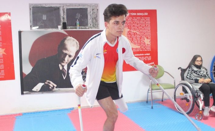 Protezini yeniletmek için gittiği yerde tanıştığı sporda milli takıma seçildi