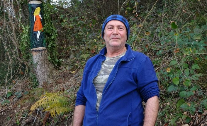 Ağaç üzerine çizdiği 3 boyutlu resimler dikkat çekiyor