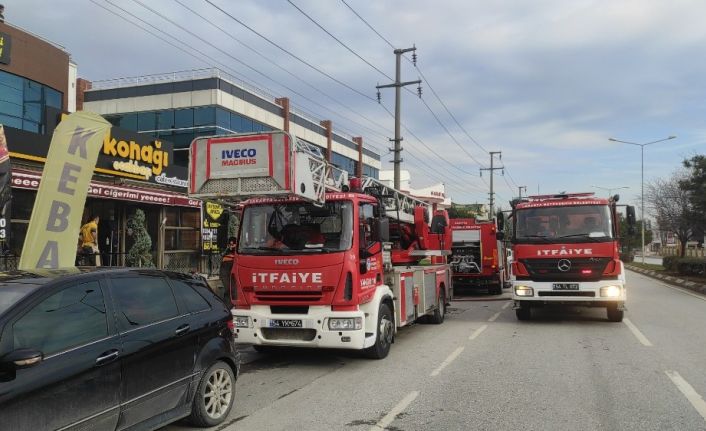 Bacası yanan işletmeyi izinli itfaiye eri kül olmaktan kurtardı