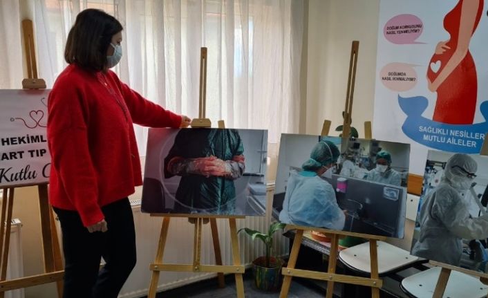 Kadın doktor hastane koridorunda pandemi de yaşananları açtığı sergi ile anlattı