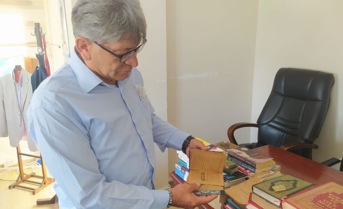 Geri dönüşüme atılan Kur’an-ı Kerimi çöpe karışmaktan temizlik işçileri kurtardı