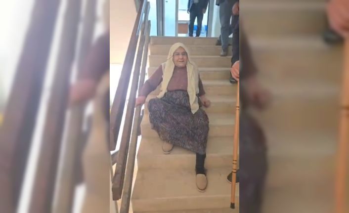 Yaşlı kadın, asansör çalışmadığı için merdivenlerden sürünerek çıkıp indi