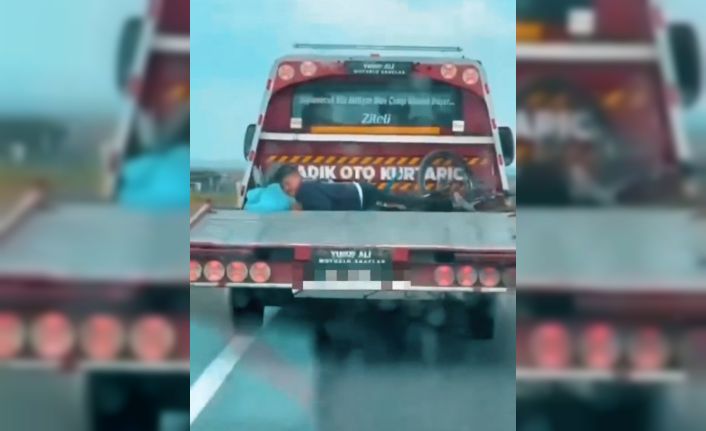 Çekici kasasında çocuk taşıdı, görüntüler dehşete düşürdü