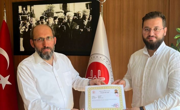 Hisarcık Kaymakamı Bahar’dan İlçe Müftüsü Akyol ve personele başarı belgesi