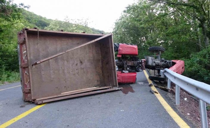 Yan yatan traktörün altında kalan sürücü ağır yaralandı