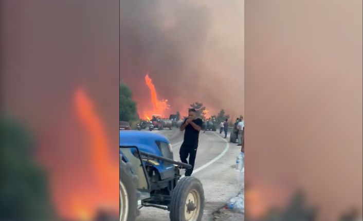 Alevler göğe ulaştı o aldırış etmeden sigarasını yaktı...