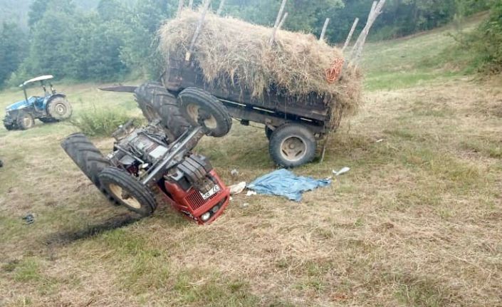 Tarlada devrilen traktörün altında kalan sürücü ağır yaralandı