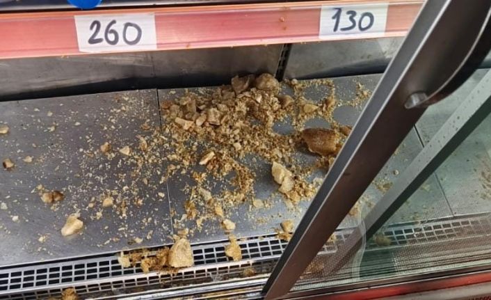 Erzurum’da iş yerinde korkutan anlar, Dolapta donan şişe patladı