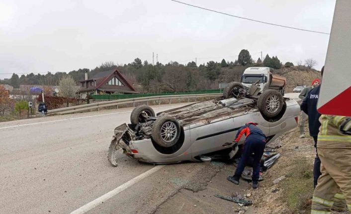 Takla atan otomobilden yara almadan kurtuldu
