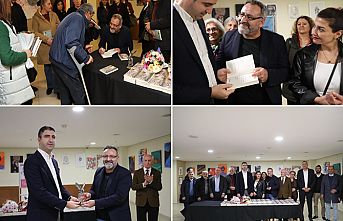 GURBETÇİ YAZAR KENAN TAŞKESEN, “AŞİL TOPUĞU” ADLI KİTABINI OKURLARI İÇİN İMZALADI