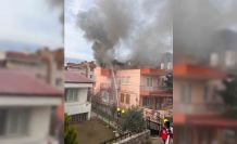 Yaşlı adam alevlerin arasında çıkarıldı