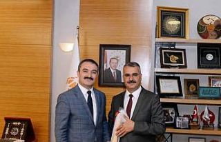 Ahlatçı’dan Rektör Öztürk’e kutlama ziyareti