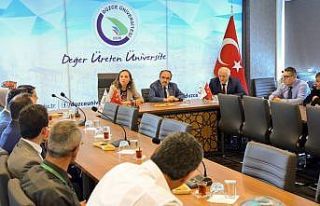 Rektör şehit yakınları ve gazilerle bir araya...