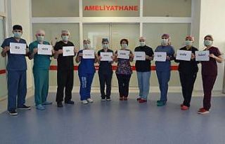 Alanya’da sağlık çalışanlarından ‘Evde kal’...