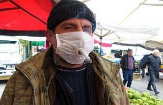 Tiryakiden korona maskesine sigara ayarı