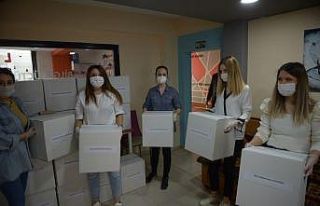 500 öğrenciden 500 aileye gıda yardımı