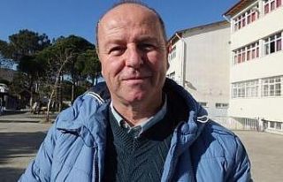 Burhaniyeli mimar Mustafa Özcan oğlunun yanında...