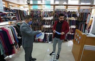 Çarşı esnafına maske dağıtıldı