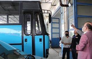 Engelli öğrenciler için hurda otobüsler kafeteryaya...