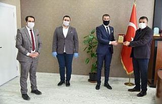 TÜGVA heyetinden Müdür Sünnetçioğlu’na ziyaret