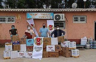 Gazetecilerden 37 aileye gıda yardımı