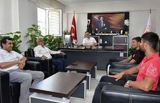 Demir, rekortmen atletleri kabul etti