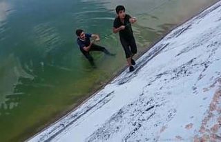 Gölete düşen çocuğu iple kurtardılar