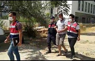 Çektiği fotoğraftaki mandal yakalanmasına neden...