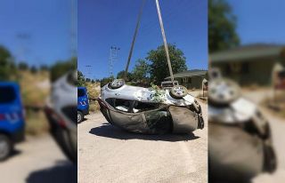 Kanyona uçan otomobil vinç yardımıyla kurtarıldı