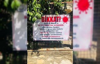 Karantina altına alınan evlere afiş asıldı
