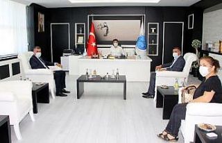 MHP İl Başkanı Demir, Rektör Karacoşkun’la...