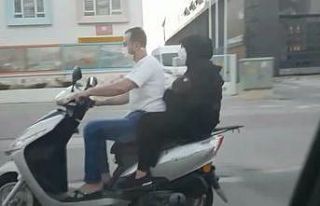 (Özel) Motosiklet üzerinde bebekli çiftin tehlikeli...