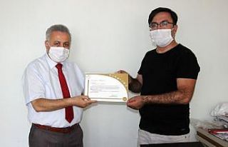 THK’dan İHA Muhabirine teşekkür belgesi
