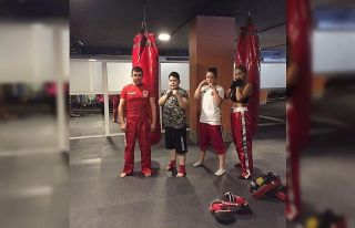 Wushu antrenörlerinin siyah kuşak sevinci
