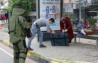 Çöpe atacağı valizi otobüs durağına bırakınca...