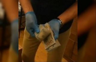 Değersiz Belarus parası ile insanları dolandıran...