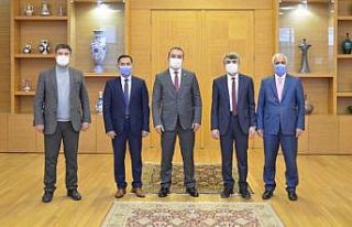 HİTÜ Rektörü Öztürk, DPÜ Rektörü Uysal’ı...
