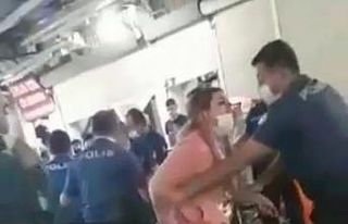 Maske cezası yazmak isteyen polise yumruk atan evli...