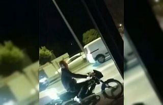 Motosiklet üzerinde önce elinde içki bardağı...