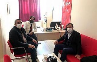 Okumuş’tan İHA’ya ziyaret