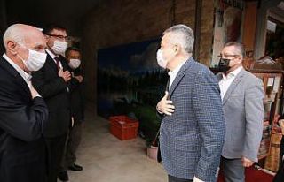 AK Partili Savaş, MHP Kuşadası İlçe Başkanı...