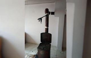 Edremit’te soba üzerinde kurumaya konan eşyalar...