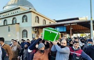 Yanarak ölen iki kardeş yan yan defnedildi