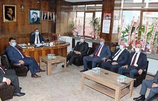 Eroğlu, GMİS Genel Sekreteri Kaya ile bir araya...