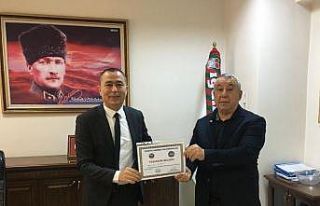 Ünsal’dan Başaran’a teşekkür belgesi