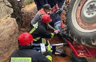 Traktörün altında kalan çiftçi ağır yaralandı