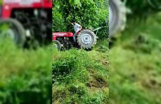 Devrilen traktörden şans eseri kurtuldu